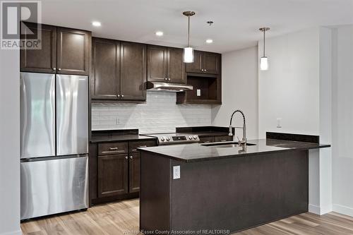 1500 Ouellette Unit# 303, Windsor, ON - Indoor Photo Showing Kitchen With Upgraded Kitchen