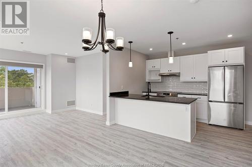 1500 Ouellette Unit# 404, Windsor, ON - Indoor Photo Showing Kitchen With Upgraded Kitchen