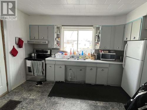 210 Main St, Smooth Rock Falls, ON - Indoor Photo Showing Kitchen With Double Sink
