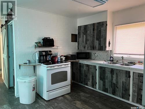 504 3Rd Street W, Meadow Lake, SK - Indoor Photo Showing Kitchen With Double Sink