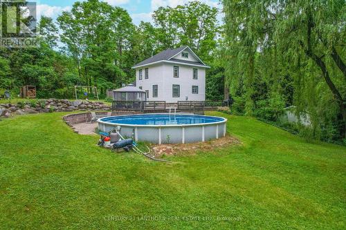 114 Bullis Road N, Brighton, ON - Outdoor With Above Ground Pool With Backyard