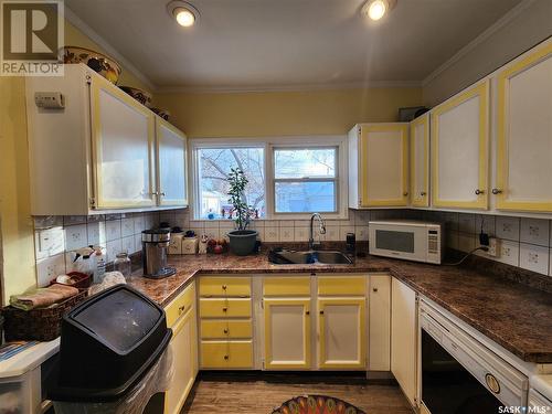 317 3Rd Street, Chaplin, SK - Indoor Photo Showing Kitchen With Double Sink