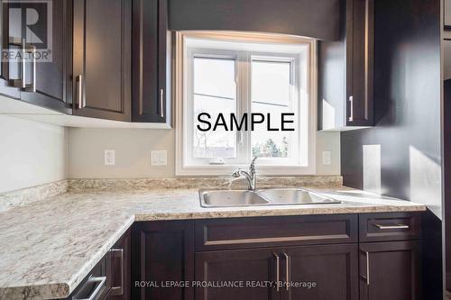 48 Mackenzie John Crescent, Brighton, ON - Indoor Photo Showing Kitchen With Double Sink