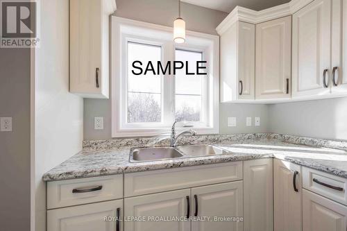 48 Mackenzie John Crescent, Brighton, ON - Indoor Photo Showing Kitchen With Double Sink