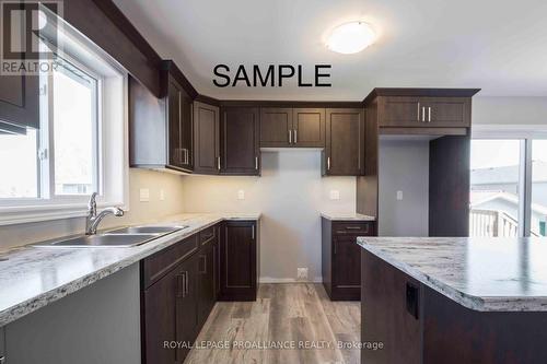 48 Mackenzie John Crescent, Brighton, ON - Indoor Photo Showing Kitchen With Double Sink