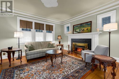 16 Nelles Blvd, Grimsby, ON - Indoor Photo Showing Living Room With Fireplace