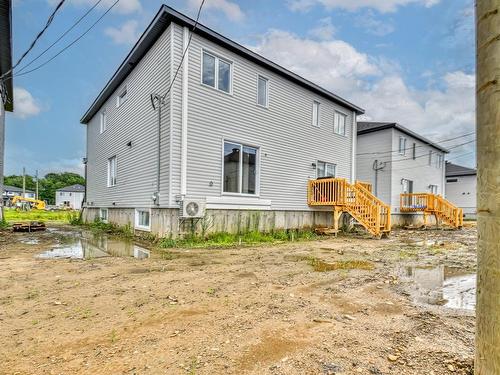 Back facade - 65 Rue Du Rossignol, Brownsburg-Chatham, QC - Outdoor With Exterior