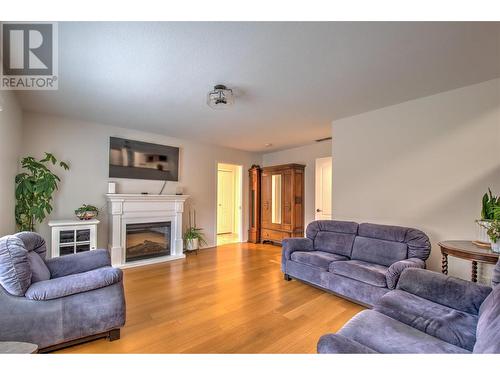 867 Mt Grady Place, Vernon, BC - Indoor Photo Showing Living Room With Fireplace