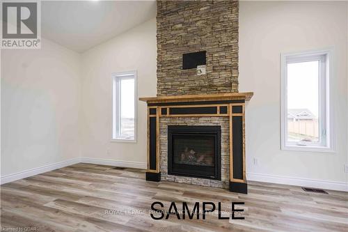 41 Clayton John Avenue, Brighton, ON - Indoor Photo Showing Living Room With Fireplace