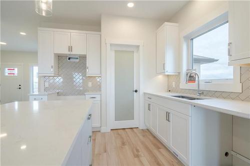 58 Wild Plum Lane, Steinbach, MB - Indoor Photo Showing Kitchen With Double Sink With Upgraded Kitchen