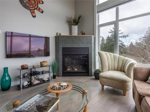 408-2676 Island Hwy South, Campbell River, BC - Indoor Photo Showing Living Room With Fireplace