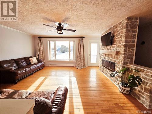 5 Richard Road, Drummond, NB - Indoor Photo Showing Living Room With Fireplace