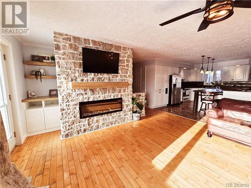 5 Richard Road, Drummond, NB - Indoor Photo Showing Living Room With Fireplace