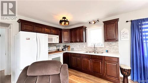 53 Nicholas, Beresford, NB - Indoor Photo Showing Kitchen With Double Sink