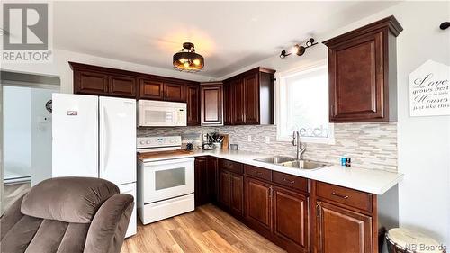 53 Nicholas, Beresford, NB - Indoor Photo Showing Kitchen With Double Sink