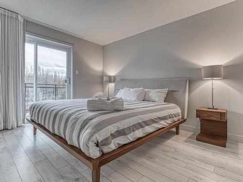 Chambre Ã Â coucher - 319-201 Rue Du Val-Des-Neiges, Beaupré, QC - Indoor Photo Showing Bedroom