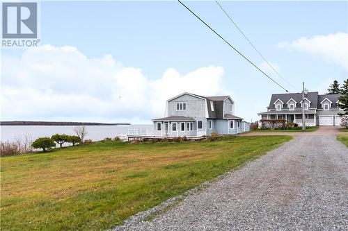 49 Soleil-Couchant St, Grande-Digue, NB - Outdoor With Body Of Water With Deck Patio Veranda
