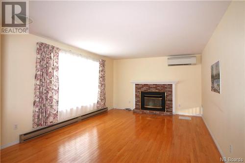45 Route 735, Mayfield, NB - Indoor Photo Showing Living Room With Fireplace