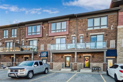 530 North Service Road|Unit #28, Grimsby, ON - Outdoor With Balcony With Facade