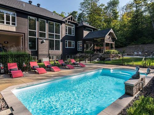 Face arriÃ¨re - 23 Rue Du Riviera, Morin-Heights, QC - Outdoor With In Ground Pool