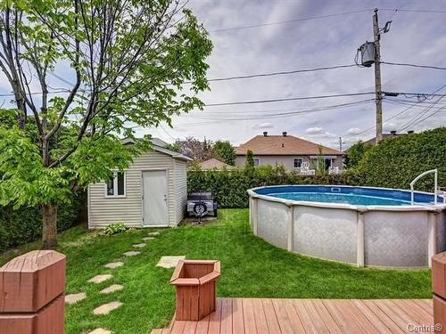 Pool - 240 Rue De L'Estran, Terrebonne (Lachenaie), QC - Outdoor With Above Ground Pool With Backyard