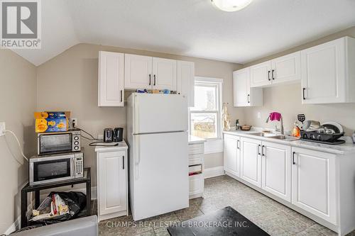 102 Queenston Street, St. Catharines, ON - Indoor Photo Showing Kitchen With Double Sink