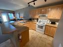 2105 - 5350 Highline Drive, Fernie, BC  - Indoor Photo Showing Kitchen With Double Sink 