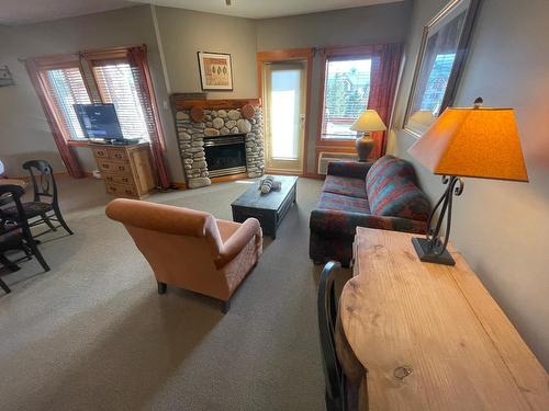 2105 - 5350 Highline Drive, Fernie, BC - Indoor Photo Showing Living Room With Fireplace