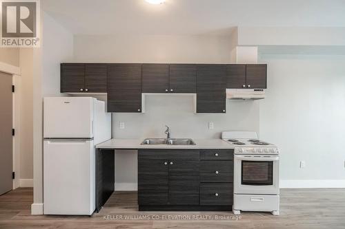 61 Thompson Rd W, Penetanguishene, ON - Indoor Photo Showing Kitchen With Double Sink