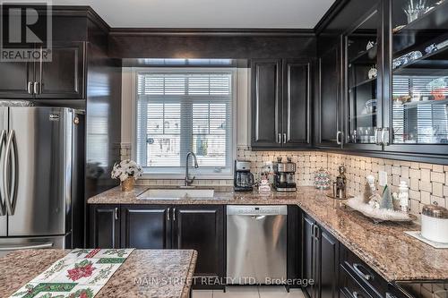 57 Riverwalk Pl, Midland, ON - Indoor Photo Showing Kitchen With Double Sink With Upgraded Kitchen