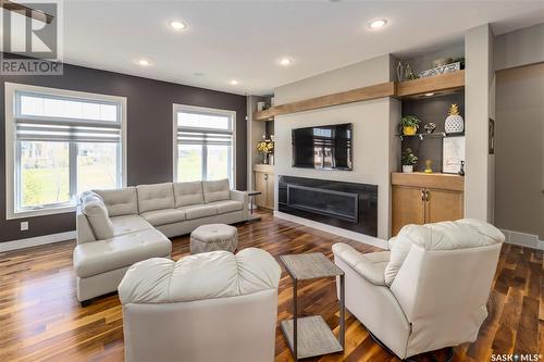 4144 Green Willow Terrace E, Regina, SK - Indoor Photo Showing Living Room With Fireplace