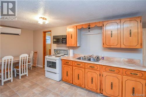 560 Saulnier Ouest Street, Tracadie, NB - Indoor Photo Showing Kitchen With Double Sink