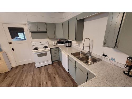 5740 Division Street, Grand Forks, BC - Indoor Photo Showing Kitchen With Double Sink