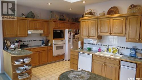 2100 Courtney Street, Regina, SK - Indoor Photo Showing Kitchen With Double Sink
