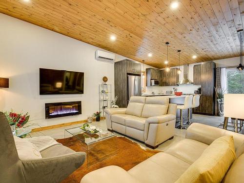 Living room - Ch. Du Golf, Sainte-Lucie-Des-Laurentides, QC - Indoor Photo Showing Living Room With Fireplace