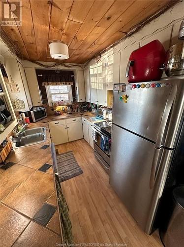 7327 Route 126, Harcourt, NB - Indoor Photo Showing Kitchen With Double Sink