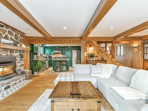 Salon - 265 Ch. De La Montagne, Piedmont, QC - Indoor Photo Showing Living Room With Fireplace