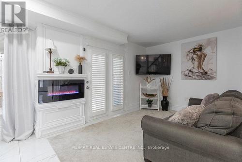 #17 -2774 King St E, Hamilton, ON - Indoor Photo Showing Living Room With Fireplace