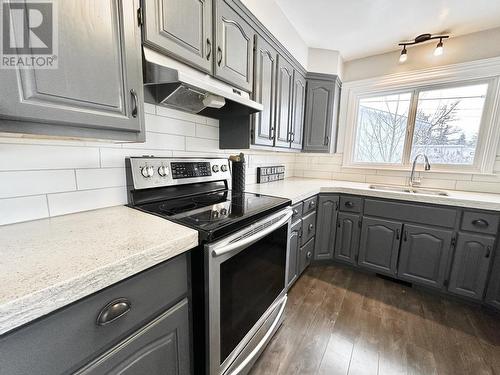69 Princess Crescent, Fort St. John, BC - Indoor Photo Showing Kitchen With Double Sink