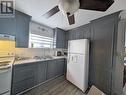 31-33 Rue Du Portage, Caraquet, NB  - Indoor Photo Showing Kitchen With Double Sink 