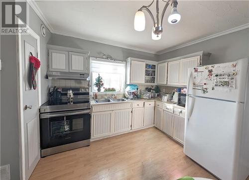 31-33 Rue Du Portage, Caraquet, NB - Indoor Photo Showing Kitchen With Double Sink