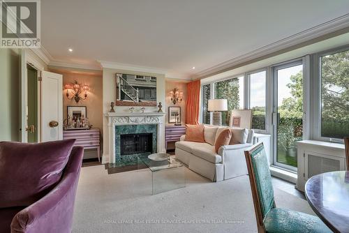 #809 -120 Rosedale Valley Rd, Toronto, ON - Indoor Photo Showing Living Room With Fireplace