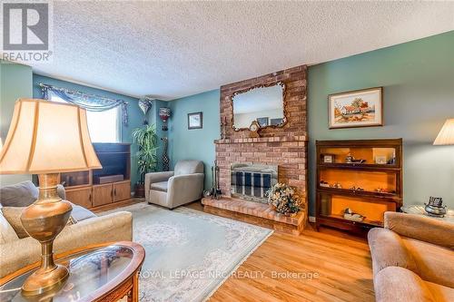 143 Briarsdale Crescent, Welland, ON - Indoor Photo Showing Living Room With Fireplace