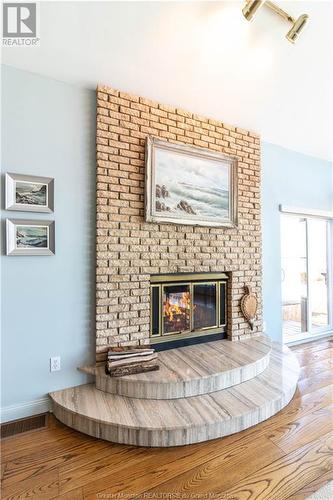 71 Ocean Breeze, Grand-Barachois, NB - Indoor Photo Showing Living Room With Fireplace