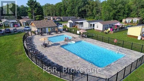 206 - 1082 Shamrock Marina Road, Gravenhurst, ON - Outdoor With In Ground Pool With Deck Patio Veranda With Backyard