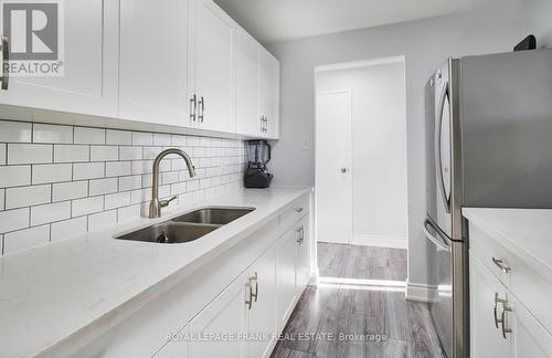 #411 -936 Glen St, Oshawa, ON - Indoor Photo Showing Kitchen With Double Sink
