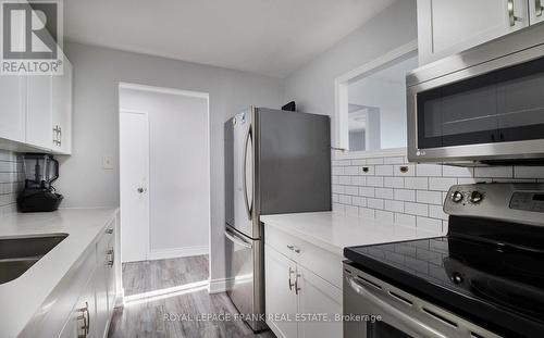 #411 -936 Glen St, Oshawa, ON - Indoor Photo Showing Kitchen With Double Sink