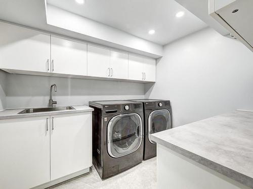 Salle de lavage - 130 Av. De Bathurst, Pointe-Claire, QC - Indoor Photo Showing Laundry Room