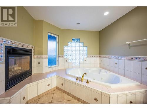 11710 Olympic View Drive, Osoyoos, BC - Indoor Photo Showing Bathroom With Fireplace