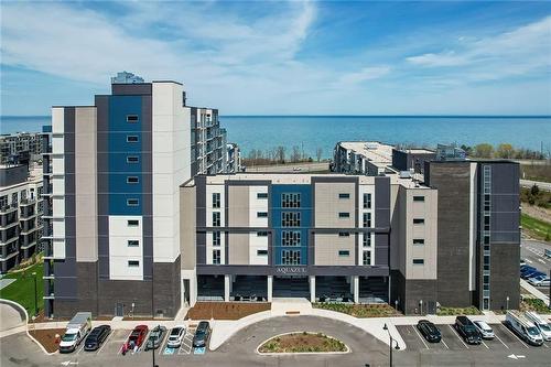 16 Concord Place|Unit #527, Grimsby, ON - Outdoor With Body Of Water With Facade